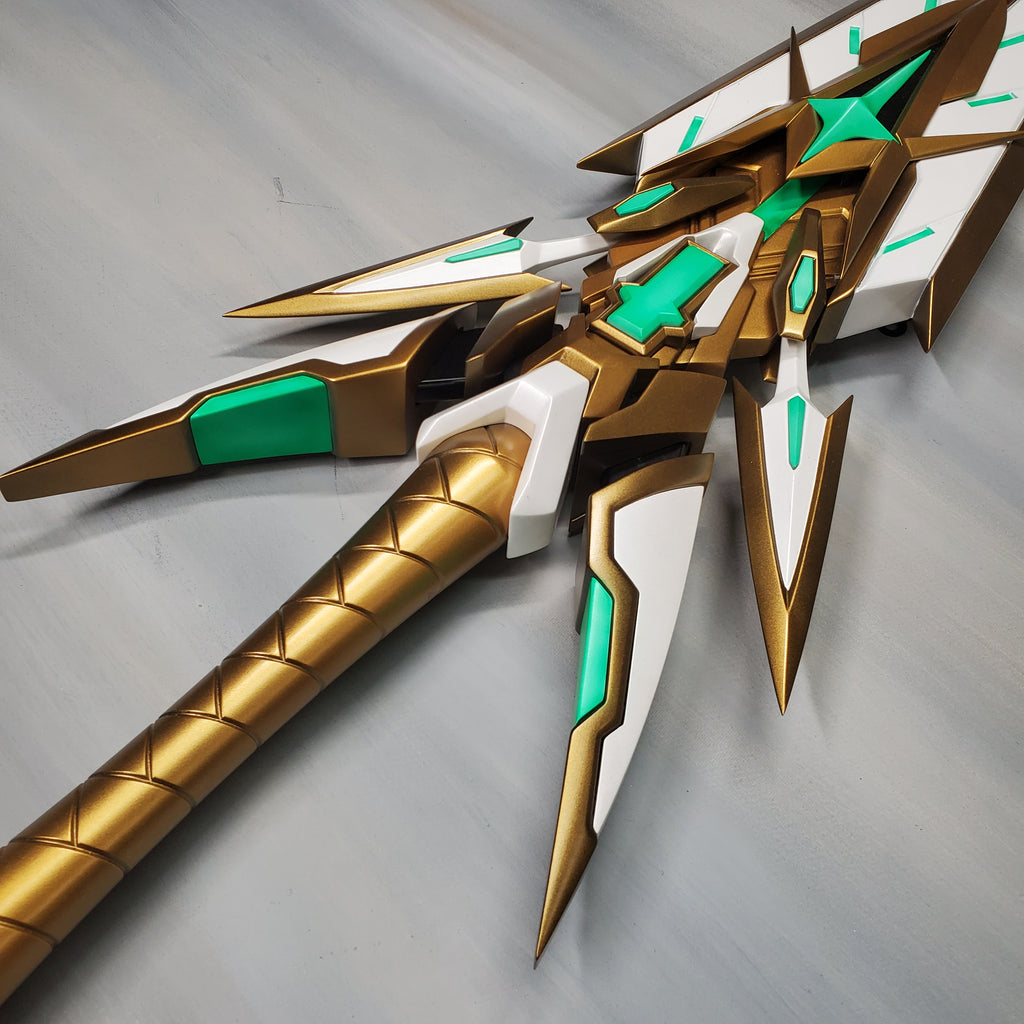 Gold and green futuristic weapon on a gray background